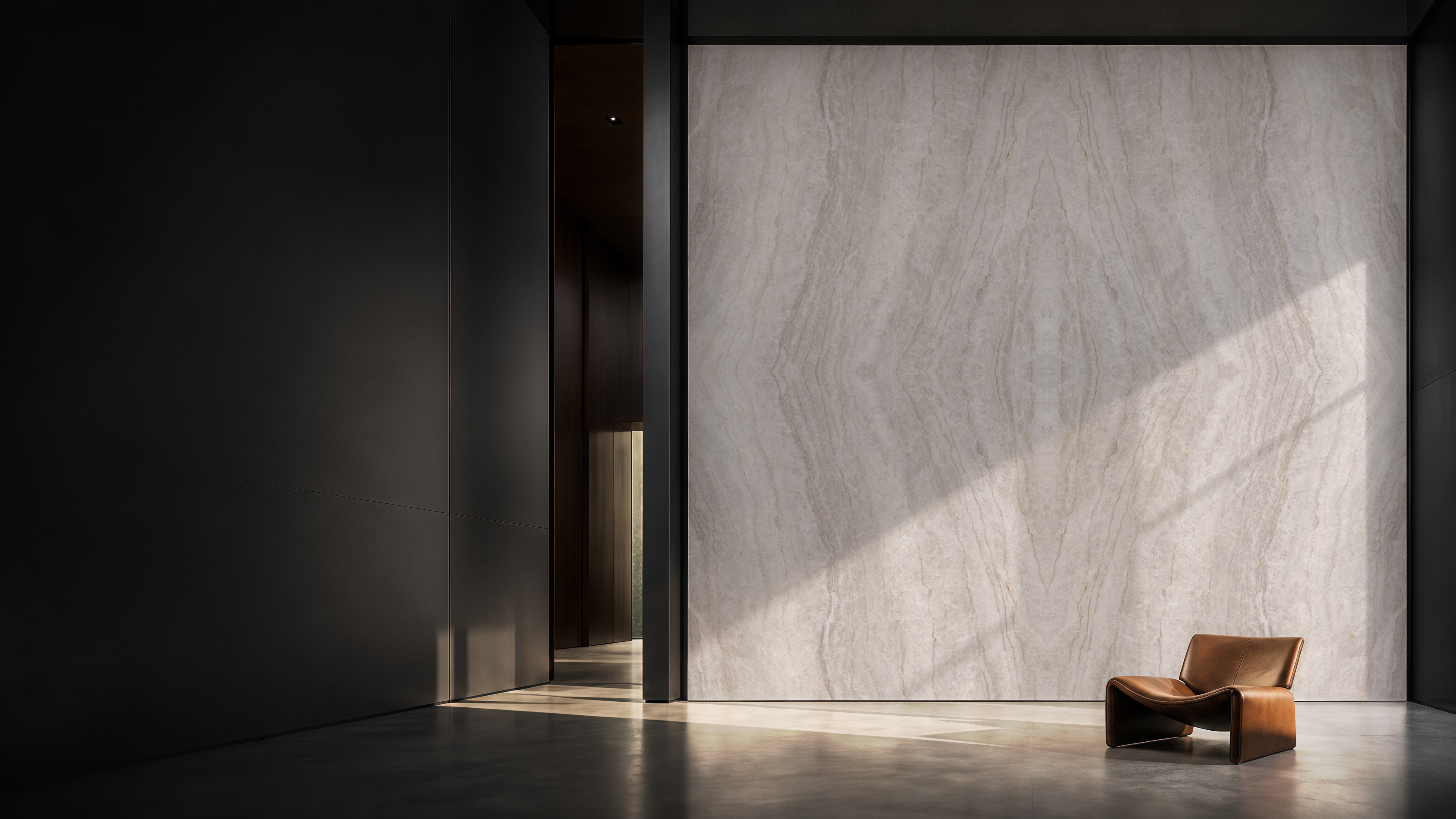 Taj Mahal Luxe as a centered bookmatched stone wall in a warm library interior — illuminated shelving on both sides, a cognac leather chair and side table at left, daylight raking across the surface